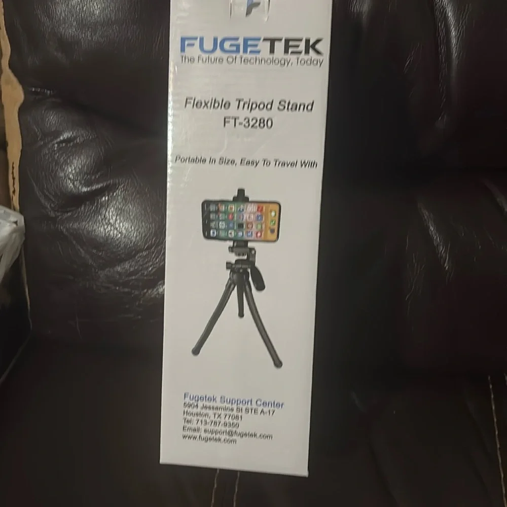 In the box brand new. Flexible tripod stand.
